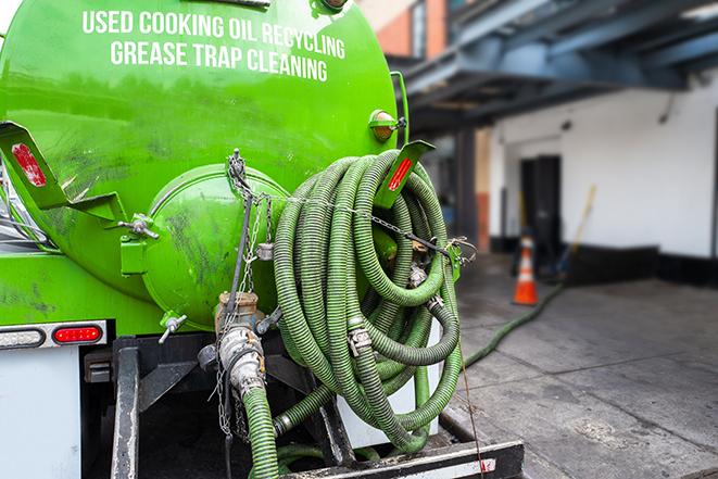 routine pumping of grease trap at a cafeteria in Boise